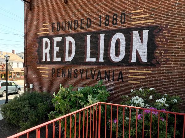 Who's Behind the Mural in Red Lion?