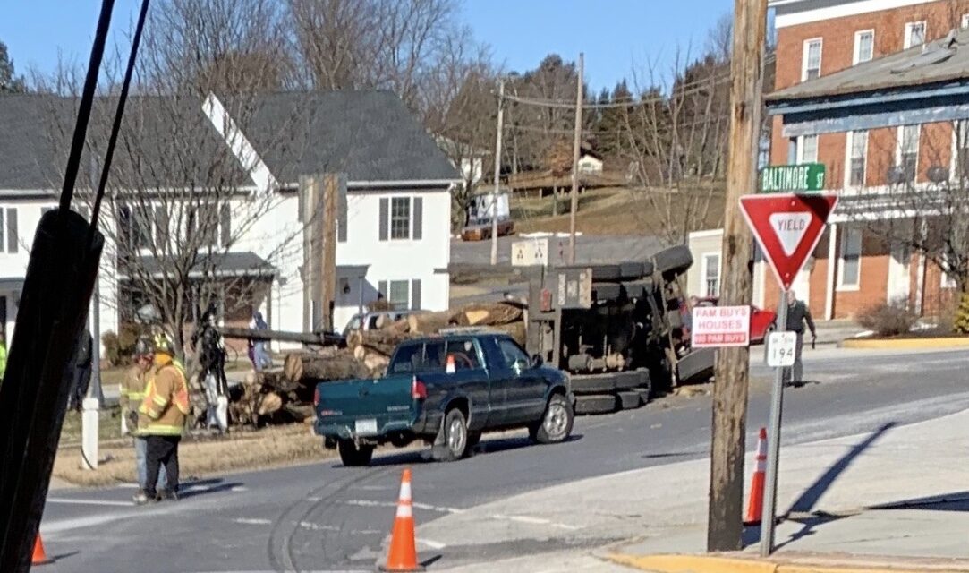 Log truck flips in Jefferson, PA