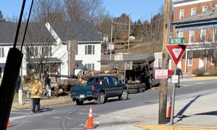 Log truck flips in Jefferson, PA