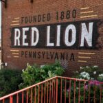 Who’s Behind the Mural in Red Lion?